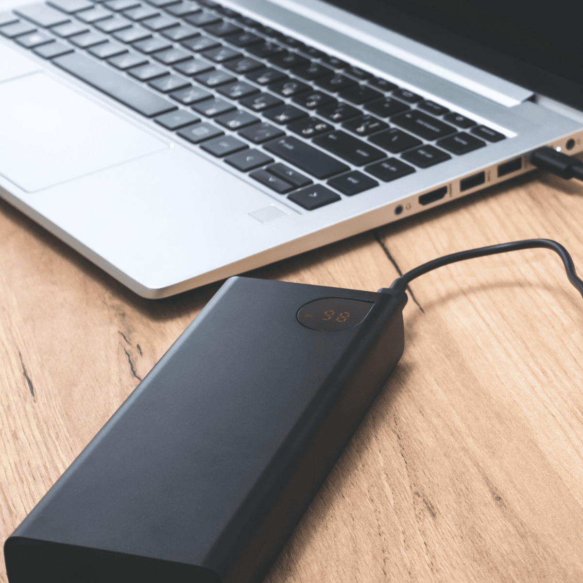 "Compact laptop adapter with a durable power brick and connector cable, designed for efficient and reliable laptop charging." "Compact laptop adapter with a durable power brick and connector cable, designed for efficient and reliable laptop charging."