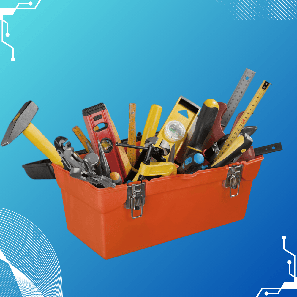 Various tools including hand tools, power tools, screwdrivers, cutters, and drill bits arranged on a workbench.