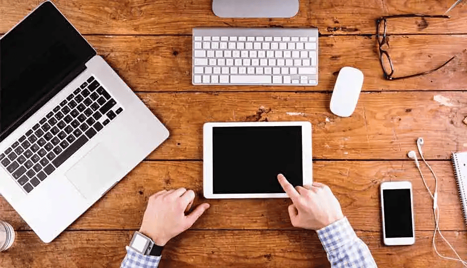 "Sleek laptop and touchscreen tablet with stylus, representing productivity and mobility." "Sleek laptop and touchscreen tablet with stylus, representing productivity and mobility."