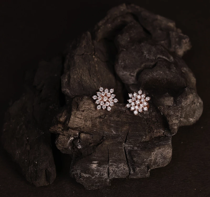 Silver swathi stud with rsegold finish