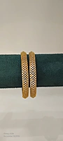 Gold covered ad stone bangle