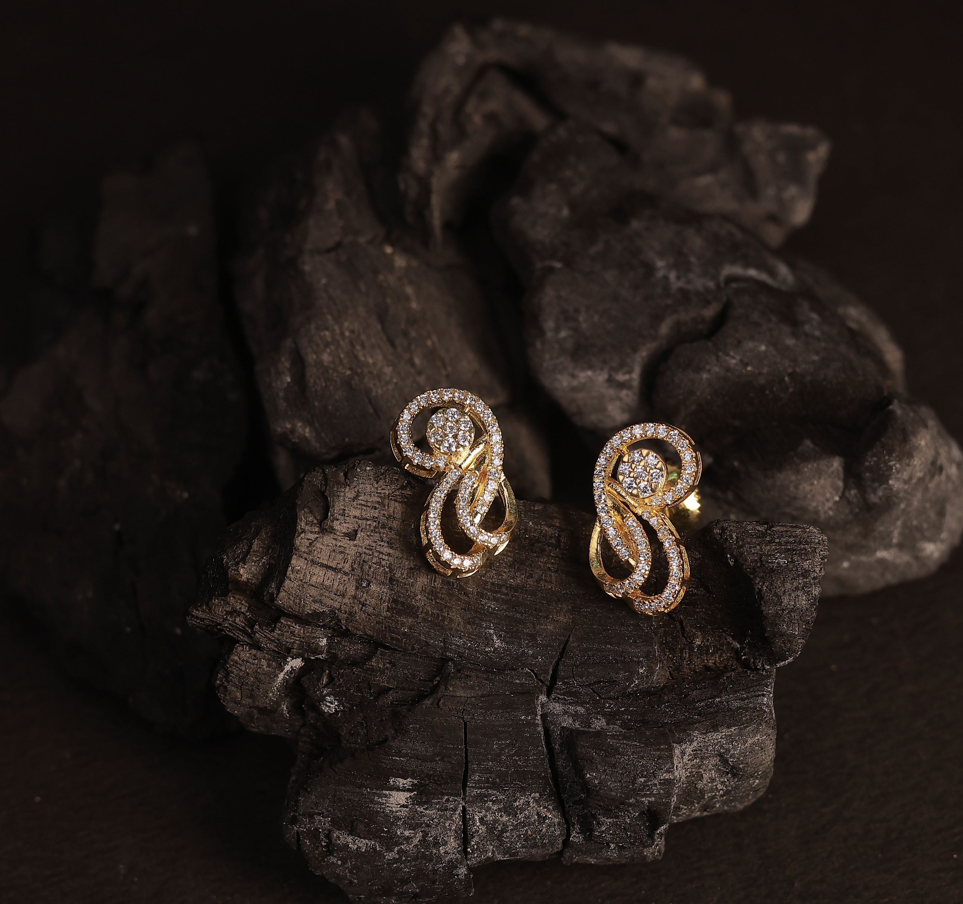 Silver twisted stud with gold finish
