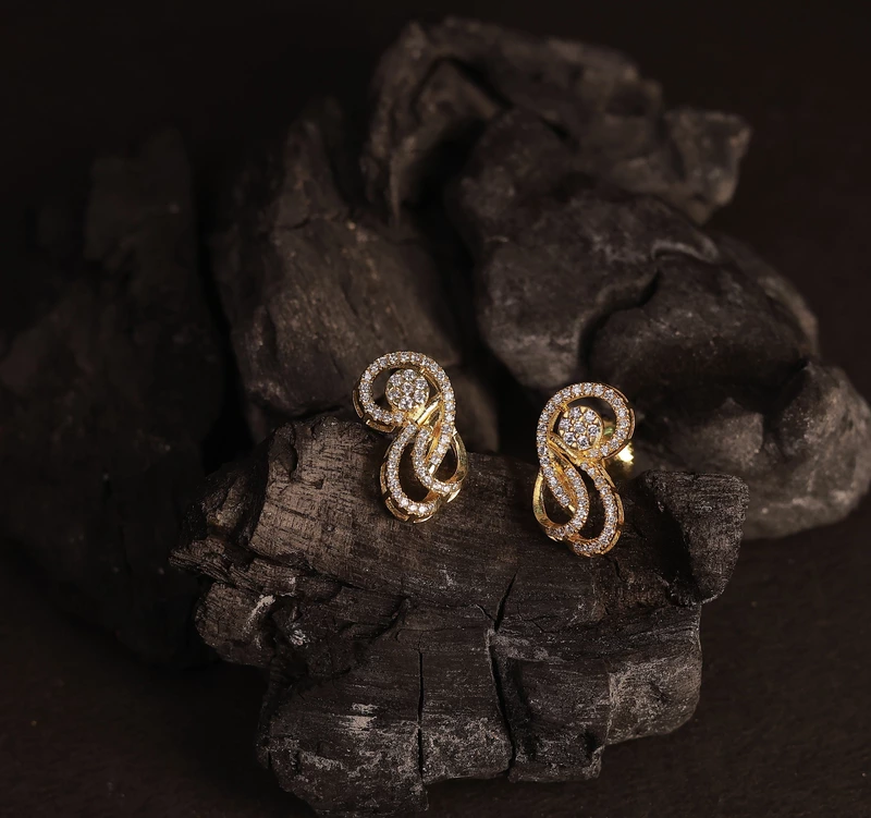 Silver twisted stud with gold finish