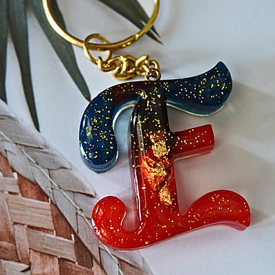 'E' PASSION KEYCHAIN9LKI00013) 'E' PASSION KEYCHAIN9LKI00013)