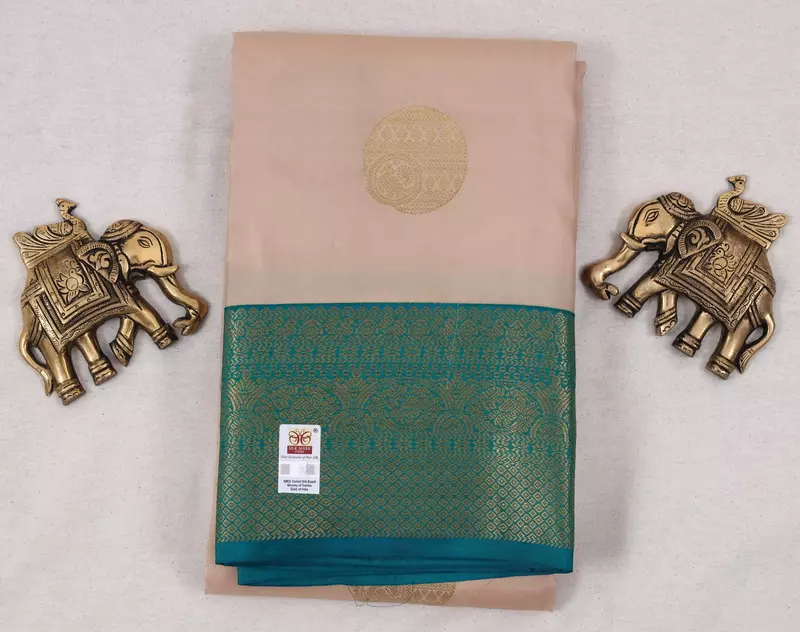 Scream silk saree with teal zari border