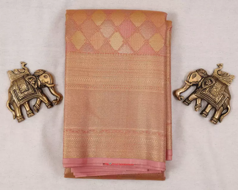 Peach orange Kanjivaram silk saree with zari border