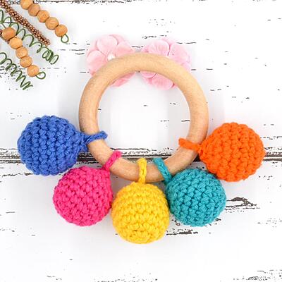 Rainbow Crochet Baby Teething Rattle – Multicolour Rainbow Crochet Baby Teething Rattle – Multicolour