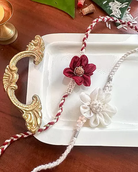 Handcrafted Floral Bhai Bahan Rakhi Set.