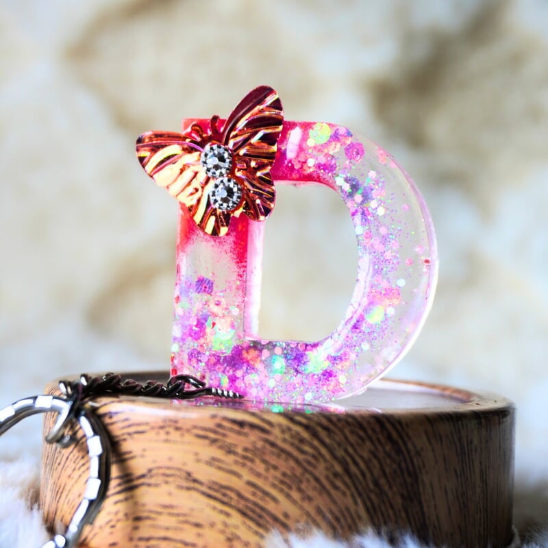 'B' LETTER WITH BUTTERFLY PINK KEYCHAIN 'B' LETTER WITH BUTTERFLY PINK KEYCHAIN