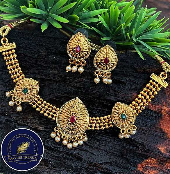 Multilayer necklace with oval shaped lockets