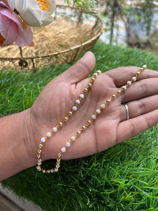 white with gold ball chain