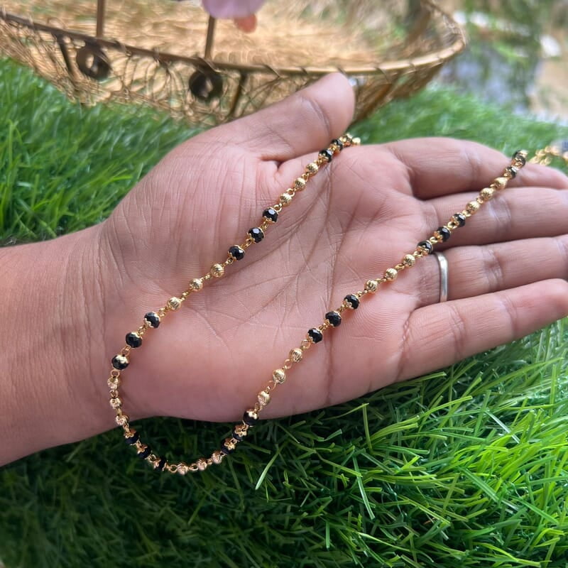 gold with black crystal