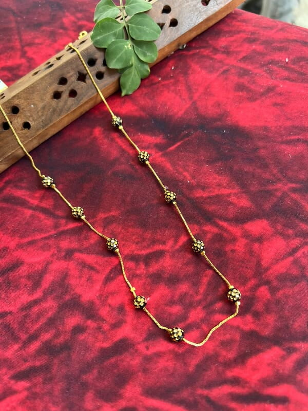Golden chain with ball design