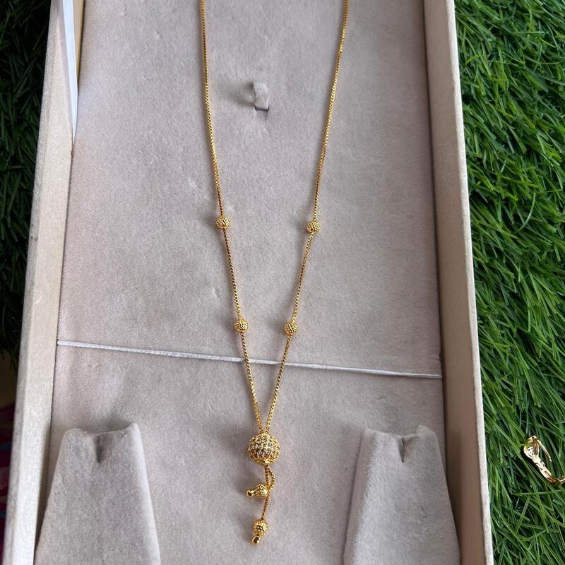Fancy gold finish with unique ball design with ad stone chain