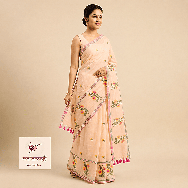 Matarangi Pastel Peach Sunflower embroidered Broad Border Saree Matarangi Pastel Peach Sunflower embroidered Broad Border Saree