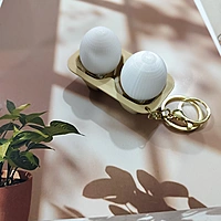 Egg Holder Button Clicker Keychain