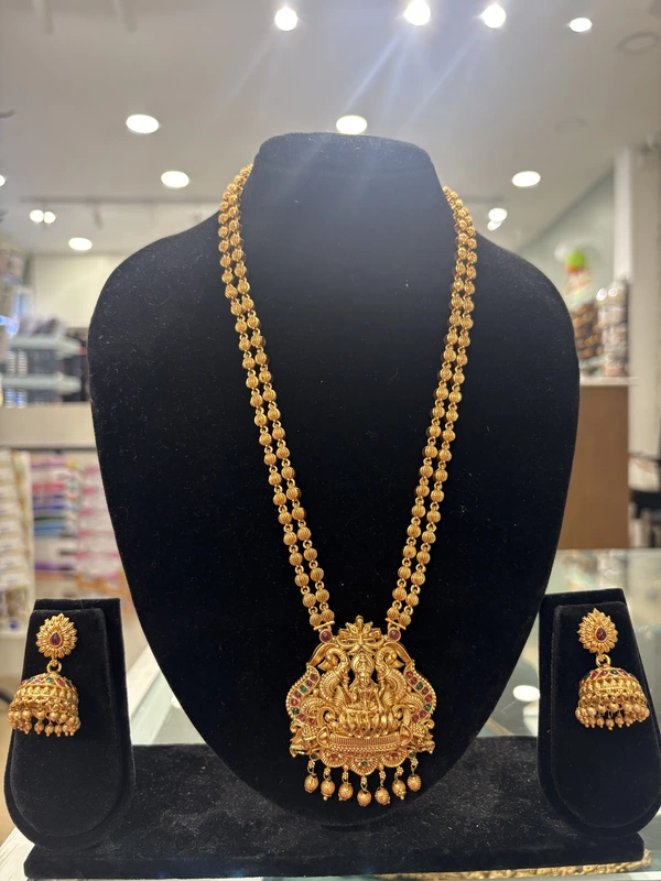 Traditional antique haaram with Lakshmi motif pendant & matching ear rings