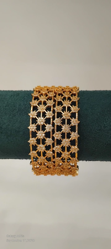 AD Stone Covered Gold Bangle
