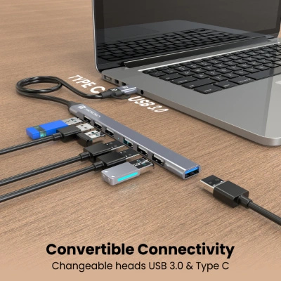 Portronics Mport 7 USB Hub (7-in-1) with dual USB & Type-C heads offers up to 5 Gbps transfer speed. It includes 1 USB 3.0 and 6 USB 2.0 ports, ideal for laptops, MacBooks, and PCs (Grey).