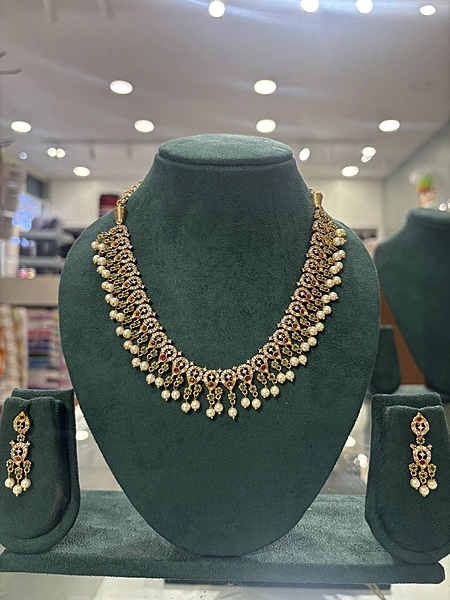 Golden AD Necklace Set with Ruby & Emerald stones and white beads