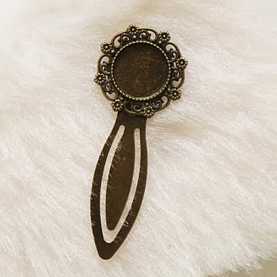 Antique Bronze Book Mark Modal 100