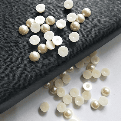 Ceramic Half Cut Beads Cream 10mm