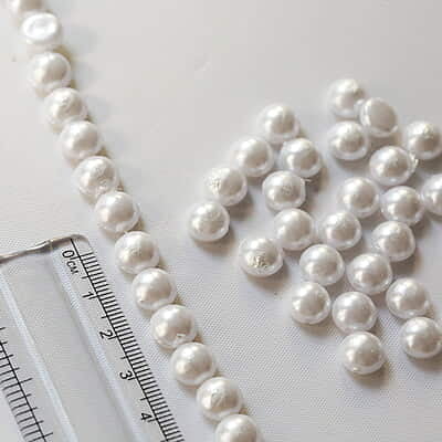 Half Cut Beads White 10 mm Half Cut Beads White 10 mm
