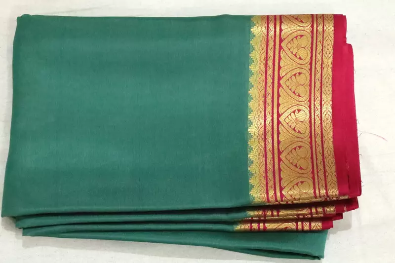 Green Mysore silk saree with rich gold zari border and pink pallu