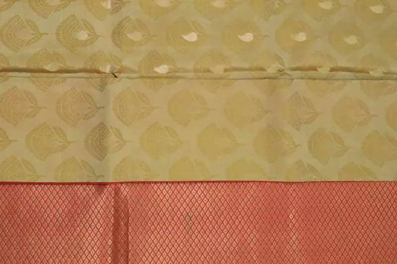 Golden beige silk saree with red zari border