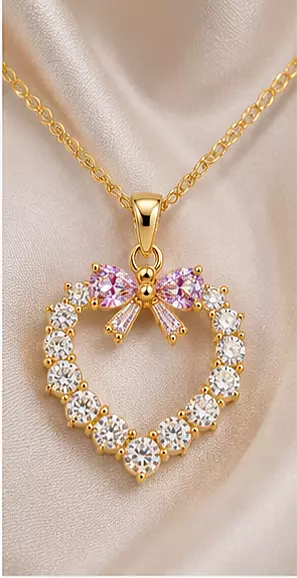 Gold-Tone Crystal Heart Pendant Necklace with Pink Bow Detail