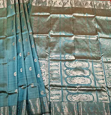 Light blue dual tone peacock motif Swarnachari saree