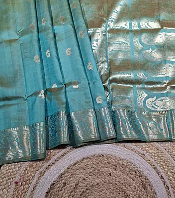 Light blue dual tone peacock motif Swarnachari saree