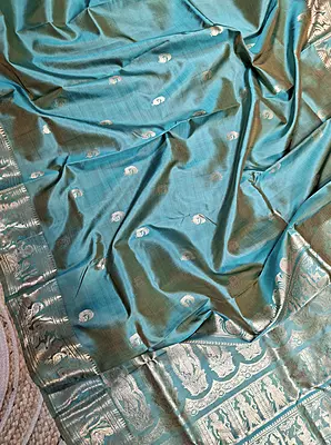 Light blue dual tone peacock motif Swarnachari saree