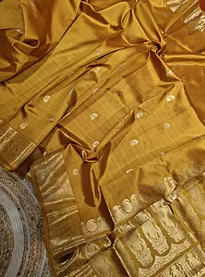 Golden mustard color resham peacock motif Swarnachari saree