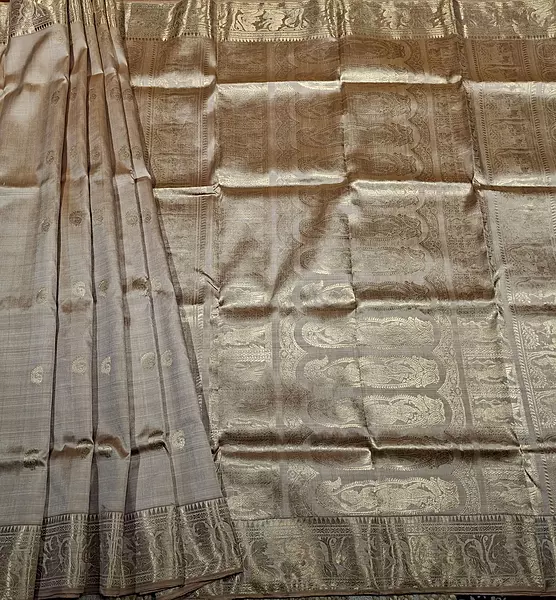 Mustard-Chandan dual color resham peacock motif swarnachari