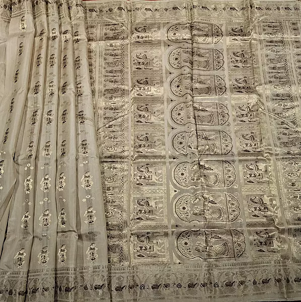 Figure motif Swarnachari in pure tassar with golden zari and dark maroon meena