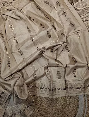 Figure motif Swarnachari in pure tassar with golden zari and dark maroon meena