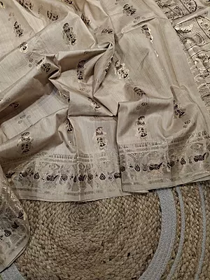 Figure motif Swarnachari in pure tassar with golden zari and dark maroon meena