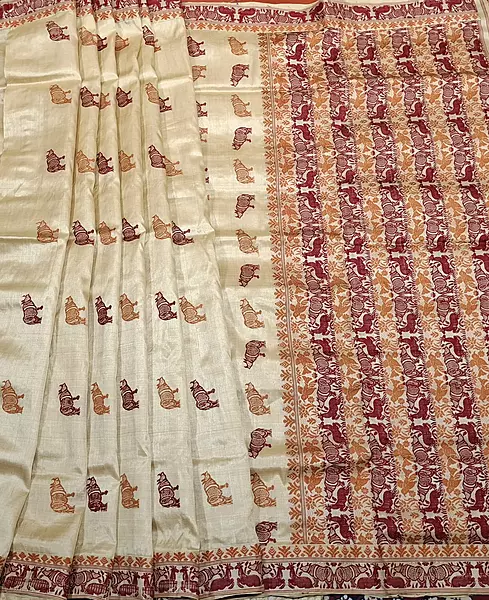 Tassar by Tassar with Maroon and mustard Assam Rhino motif Tassar by Tassar with Maroon and mustard Assam Rhino motif