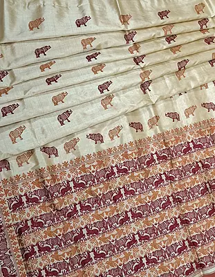 Tassar by Tassar with Maroon and mustard Assam Rhino motif Tassar by Tassar with Maroon and mustard Assam Rhino motif