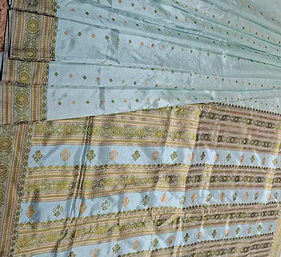 Assam Paat Silk Saree in Powdered Mint with Olive Green & Mustard Buta