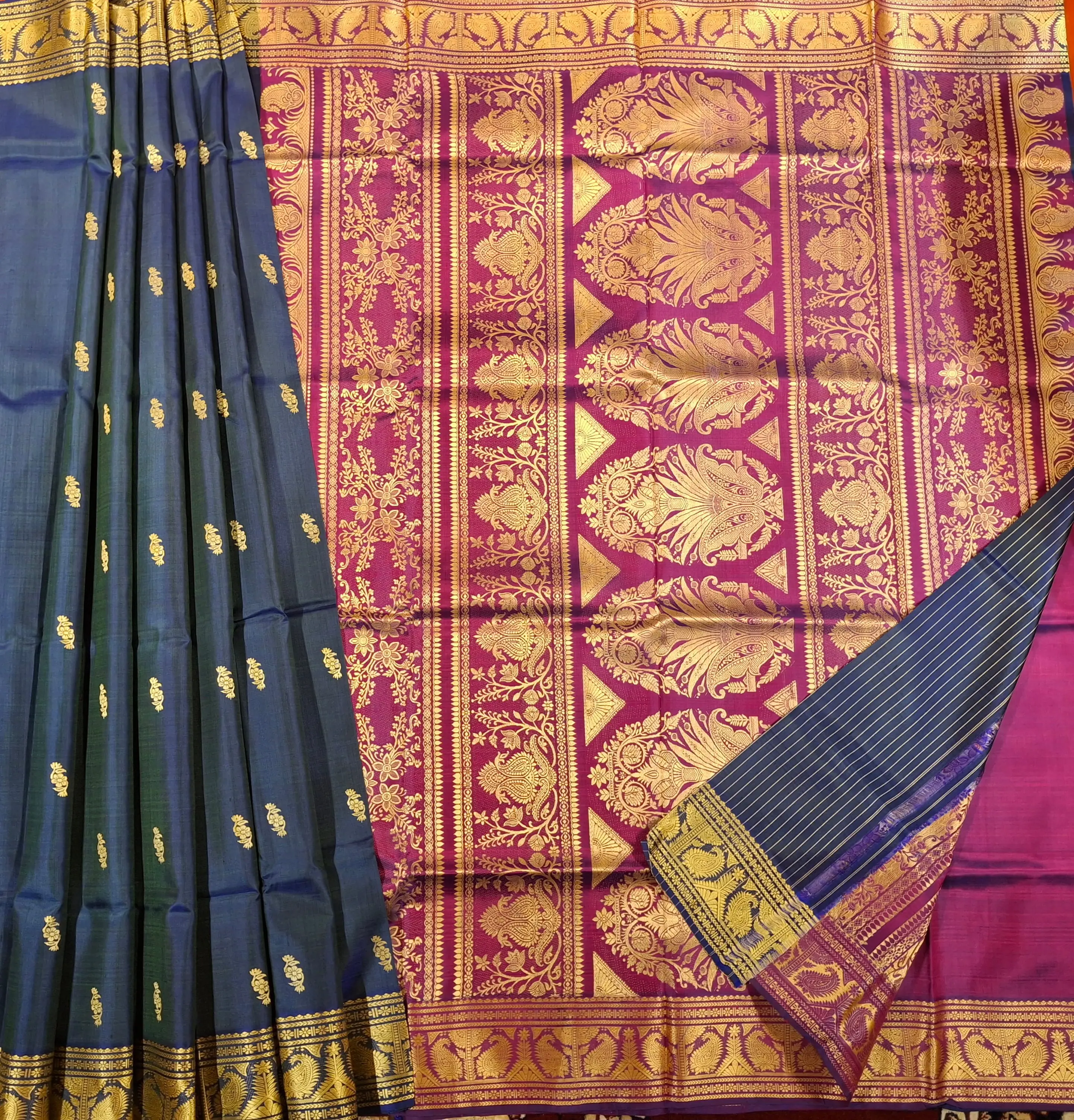 Blue and bottle green dual tone color pure Mulberry silk Baluchari saree from our Kadambari Series