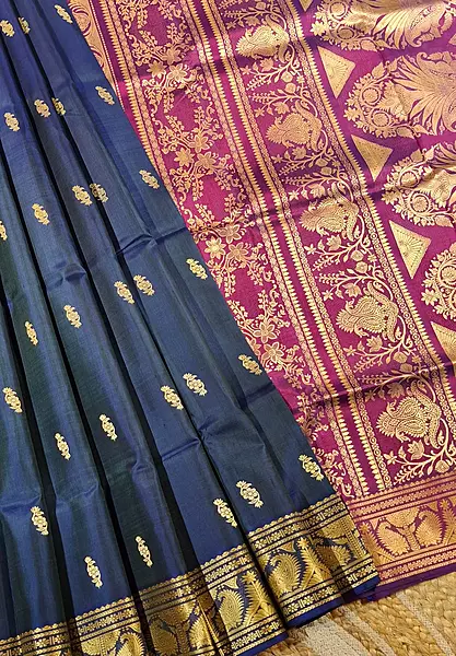 Blue and bottle green dual tone color pure Mulberry silk Baluchari saree from our Kadambari Series