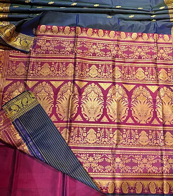 Blue and bottle green dual tone color pure Mulberry silk Baluchari saree from our Kadambari Series