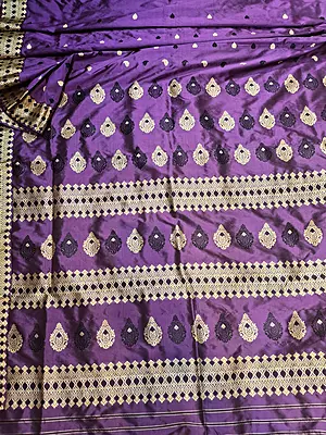 Assam Paat Silk Saree in dark Aubergine with Black and Mustard Woven Motifs Assam Paat Silk Saree in dark Aubergine with Black and Mustard Woven Motifs