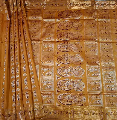 Figure motif Swarnachari Color Golden mustard saree with antique copper zari