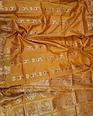 Figure motif Swarnachari Color Golden mustard saree with antique copper zari
