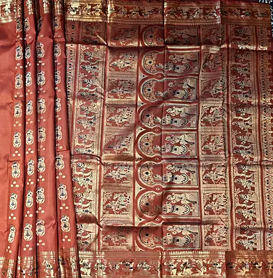Rust colour pure Mulberry silk Swarnachari saree. Rust colour pure Mulberry silk Swarnachari saree.
