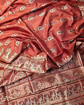 Rust colour pure Mulberry silk Swarnachari saree. Rust colour pure Mulberry silk Swarnachari saree.
