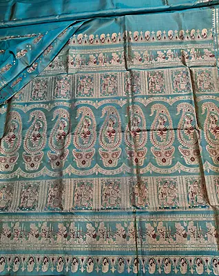 Sea green and mustard dual tone pure Mulberry silk Baluchari saree